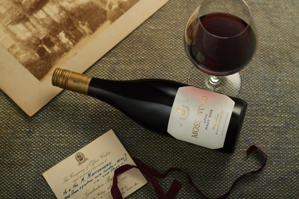 Moss Wood Pinot Noir bottle image with atmospheric background.